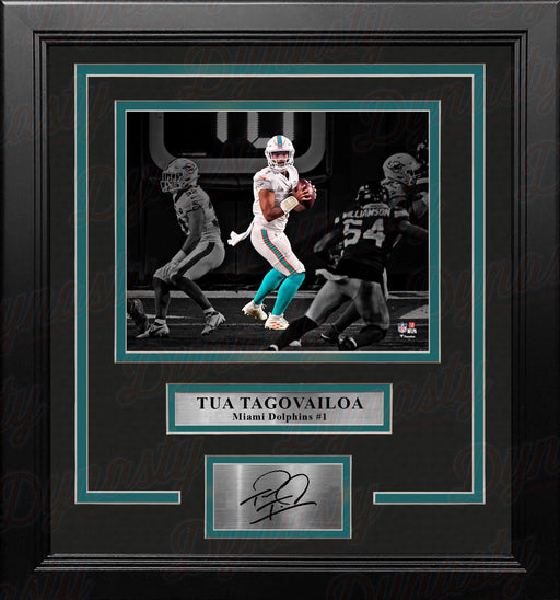Tua Tagovailoa in Action Miami Dolphins 8x10 Framed Blackout Football Photo with Engraved Autograph - for just $79.99! 