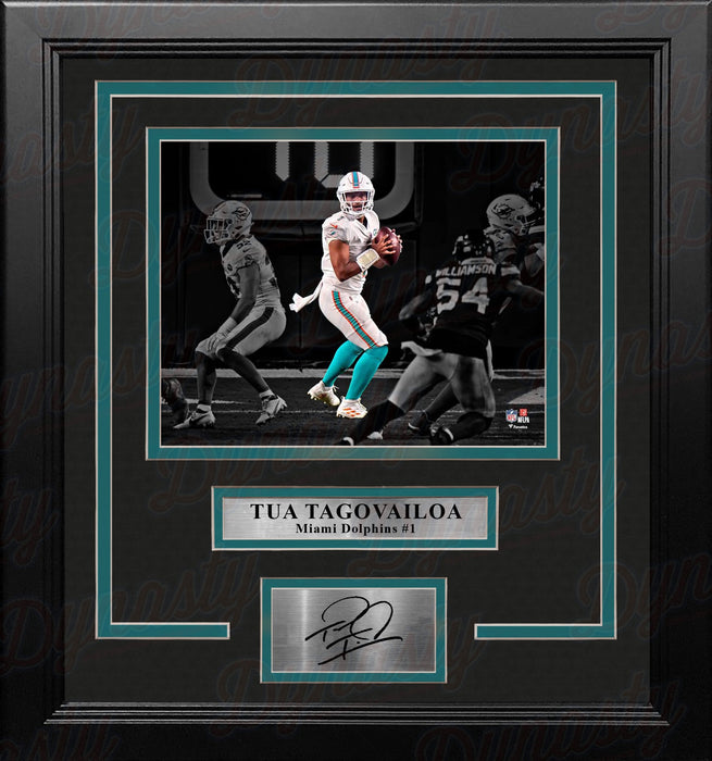 Tua Tagovailoa in Action Miami Dolphins 8x10 Framed Blackout Football Photo with Engraved Autograph - for just $79.99! 