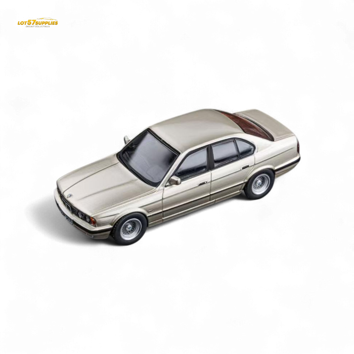 (Pre-Order) DCM BMW E34 5-Series Sedan Cashmere Beagle Gold 1:64 - for just $29.99! 