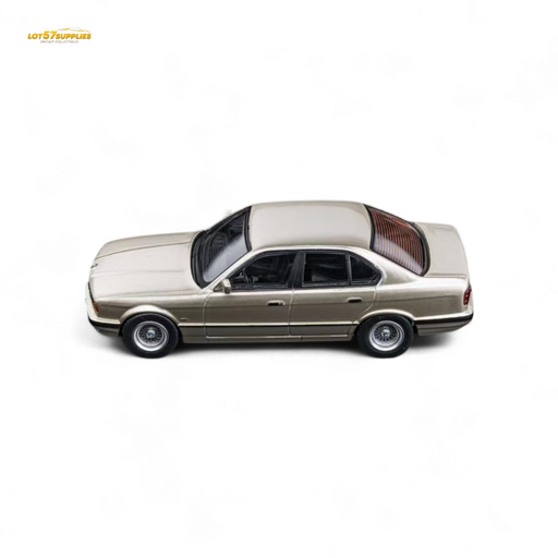 DCM BMW E34 5-Series Sedan Cashmere Beagle Gold 1:64 - for just $29.99! 