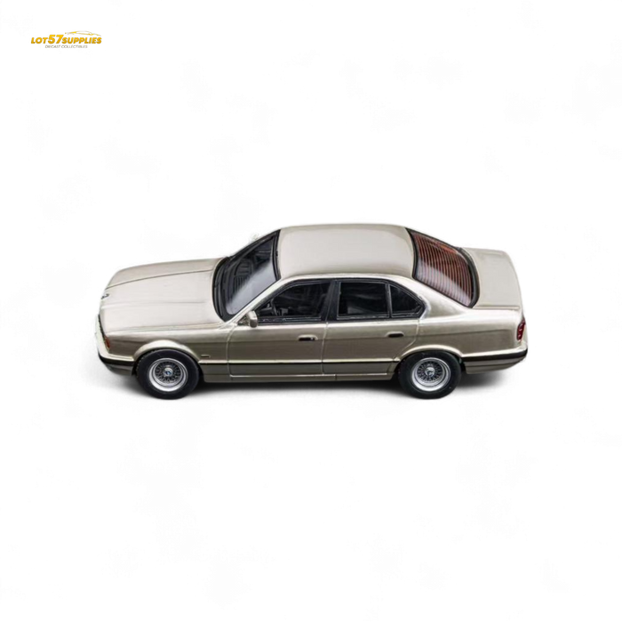 (Pre-Order) DCM BMW E34 5-Series Sedan Cashmere Beagle Gold 1:64 - for just $29.99! 