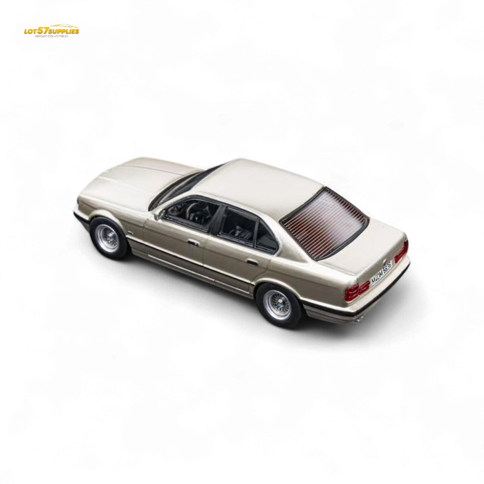 (Pre-Order) DCM BMW E34 5-Series Sedan Cashmere Beagle Gold 1:64 - for just $29.99! 