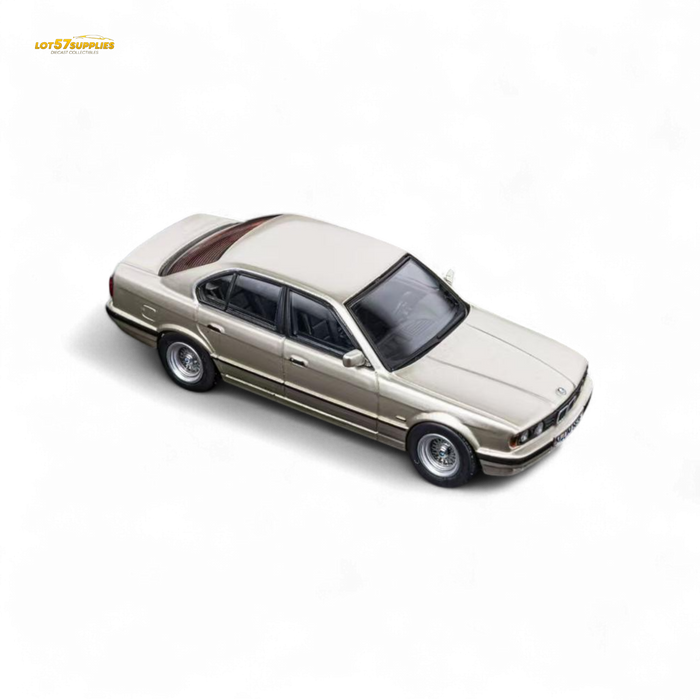 (Pre-Order) DCM BMW E34 5-Series Sedan Cashmere Beagle Gold 1:64 - for just $29.99! 