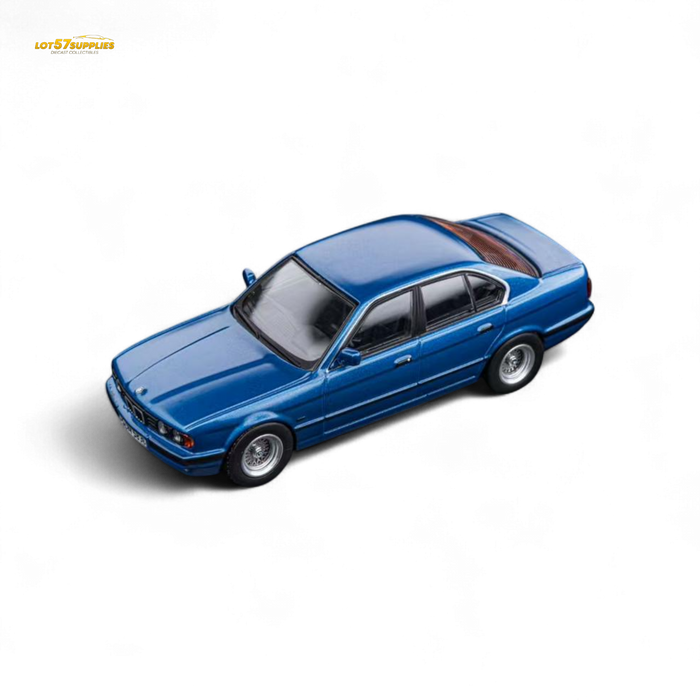 DCM BMW E34 5-Series Sedan Avis Metallic Blue 1:64 - for just $29.99! 