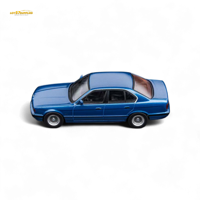 DCM BMW E34 5-Series Sedan Avis Metallic Blue 1:64 - for just $29.99! 