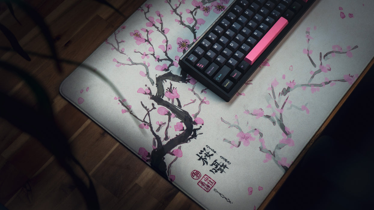 "Whispers of Sakura" — Cherry Blossom Deskmat - for just $49.95! 