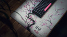 "Whispers of Sakura" — Cherry Blossom Deskmat - for just $49.95! 