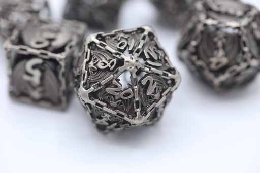 Ancient Silver Hollow Metal Bat Polyhedral Dice Set - for just $69.99! 