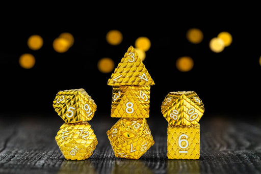 D&D Dragon Scale Metal Dice Set — Gold - for just $49.99! 