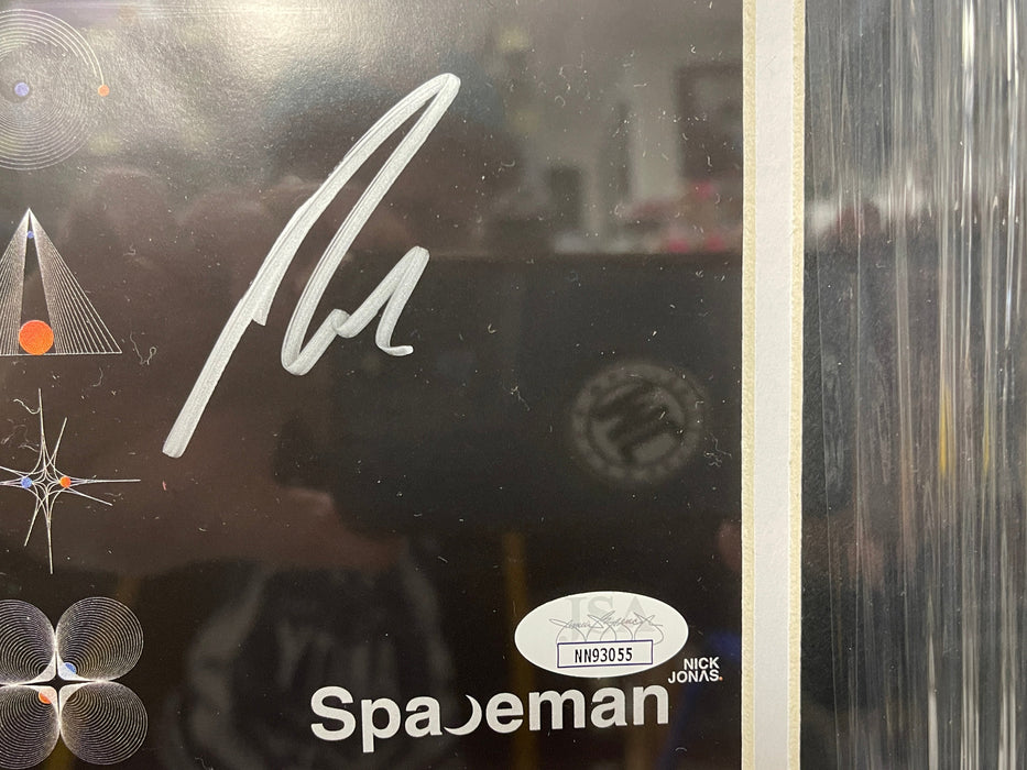 Nick Jonas Signed & Custom Framed Spaceman CD Insert With JSA COA - for just $350! 