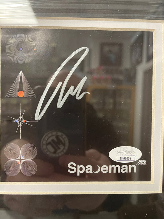 Nick Jonas Signed & Custom Framed Spaceman CD Insert With JSA COA - for just $350! 