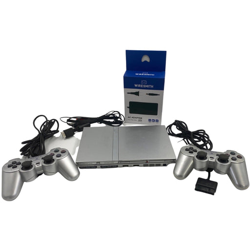 Silver Slim PlayStation 2 System - Premium Video Game Consoles - Just $161.99! Shop now at Retro Gaming of Denver